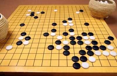 围棋职业二段与业余二段实力差距深度解析，悬殊对比与让子策略探讨